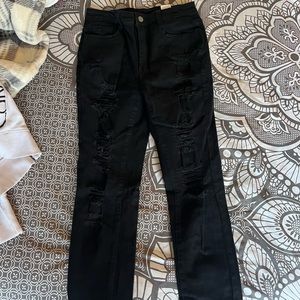 Never worn black ripped jeans